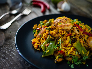 Paella seafood on wooden background