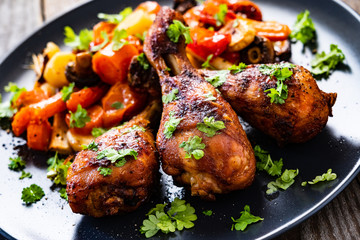 Barbecue chicken drumsticks with roast vegetables