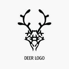 Deer animal logo, black head sign. Hand drawn. Modern tribal ethnic design. Doodle. Fashion print for clothes, cards, picture banner for websites. Vector illustration
