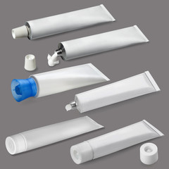 Six tubes of white color on a gray background