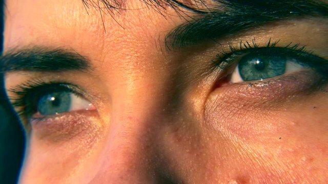 Close-up. Macro Blue Female Human Eye. Pupil Cornea Iris Eyeball Eyelashes. Blink Open Closed. 30p Slow motion 1/2 Real Time Speed 60p