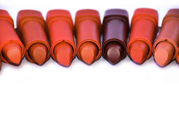 Lipstick colors arranged on a white background.