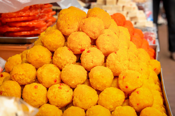 Traditional Indian sweets sold on street vending stalls