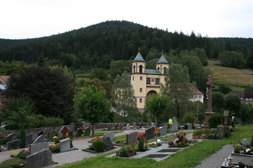 Fototapeta na wymiar Graveyard in Bad Rippoldsau-Schapbach, Baden-Württemberg, Black Forest, Germany, 