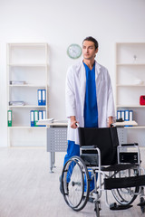 Young male doctor working in the clinic
