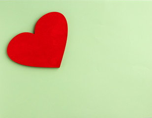 Red heart on a green background