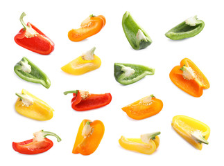 Set of different ripe bell peppers on white background