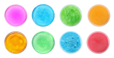 Set of different colorful slimes on white background, top view. Antistress toy