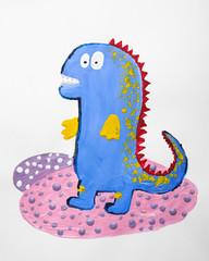 Child's painting of dinosaur on white paper