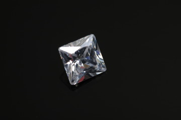 Briliant sparkling clear diamond, close up shoot on isolated background