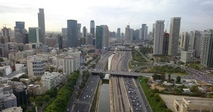 Aerial footage over Tel aviv and Ramat gan city skyline Drone view over Ayalon, Ramat Gan & Tel aviv Skyline with traffic