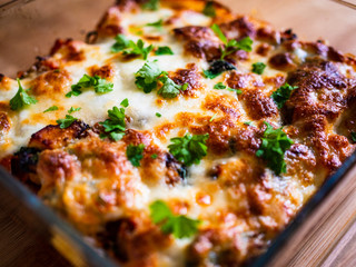 Pasta casserole with barbecue chicken breast, cheese and vegetables