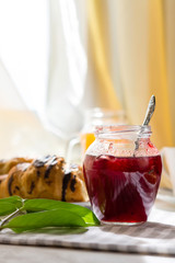Continental breakfast - coffee, orange juice and toast on white wood table. Background with free text space.
