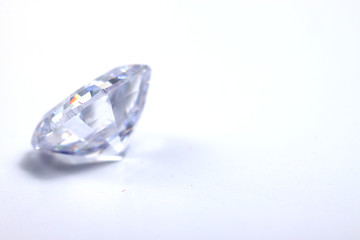 Briliant sparkling clear diamond, close up shoot on isolated background
