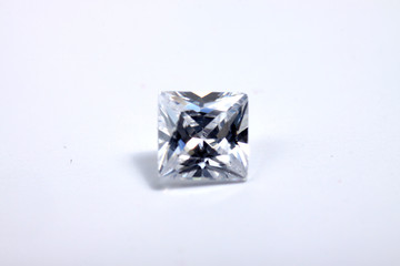 Briliant sparkling clear diamond, close up shoot on isolated background