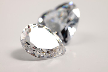 Close up shoot of shinny diamond that faceted to pear shapes isolated background