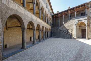 Fototapeta na wymiar BRACCIANO / ITALY - JULY 2015: Inner yard of medieval castle of Bracciano, Italy