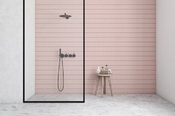 Pink and white bathroom interior with shower