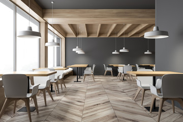 Fototapeta na wymiar Gray loft cafe interior with square tables