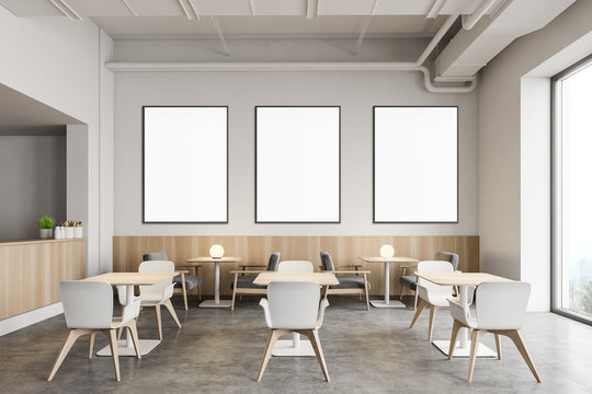Stylish industrial style restaurant with posters