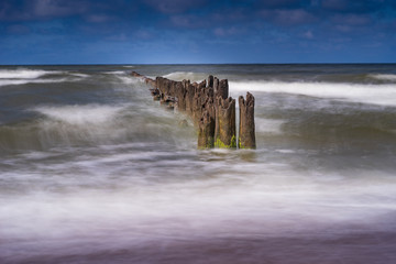 Old harbor ruins. Blue sea and port. Harbour in Baltic sea, Latvia, Europe