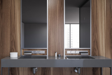 Double sink in wooden bathroom