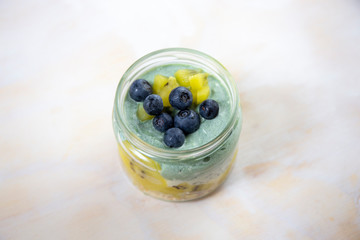 Homemade Chia pudding with kiwi in the glass jar