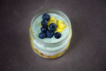 Homemade Chia pudding with kiwi in the glass jar