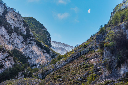 Canyon in the Mountains of Southern Italy with Moon in the Sky