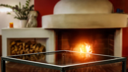 Desk of free space and fireplace in home interior 