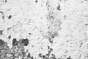 Texture of a concrete wall with cracks and scratches which can be used as a background