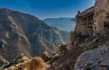 Moon in Blue Sky over Ancient Abandoned Italian Mountain Village