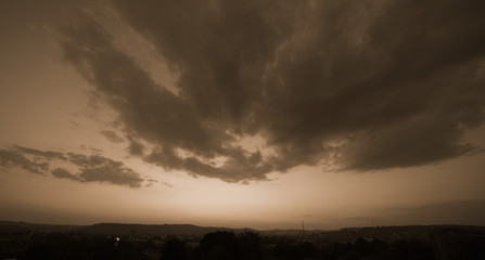 Beautiful sunset sky above clouds with dramatic light.