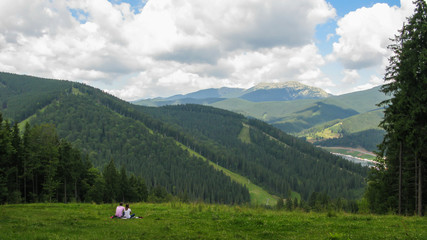 Fototapeta na wymiar view of the Carpathian mountains from the top of Bukovel mountain, Carpathian mountains, Ukraine