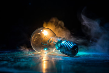 Abstract dark background with creative artwork decoration of glowing bulbs.