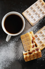 Waffles with jam and coffee