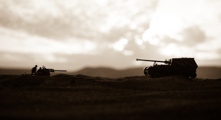 War Concept. Military silhouettes fighting scene on war fog sky background, World War German Tanks...
