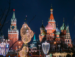 Moscow, Russia. St. Basil's Cathedral and Spasskaya Tower at night on New Year's holidays. View from Zaryadye park - 316513609