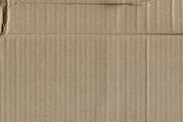 Fototapeta premium Close up grainy decorative light brown vintage rough sheet of carton. Cardboard paper texture blank background. Brown color old pattern empty papercraft surface. Recycled ecology friendly material.