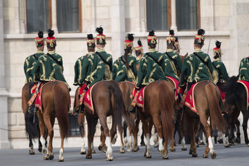 Hungarian hussars on horseback.
