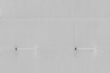 Close up grainy decorative light brown vintage rough sheet of carton. Cardboard paper texture blank background. Brown color old pattern empty papercraft surface. Recycled ecology friendly material.