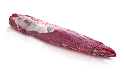 Solomillo de vaca sobre fondo blanco, en crudo. Raw beef tenderloin on a white background.