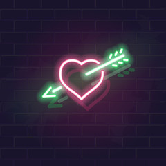 Neon heart and arrow vector icon on brick wall background. Fall in love symbol for st. valentines day poster, flyer, party, banner or social network post.