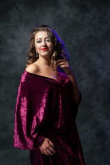 Girl draped in velvet