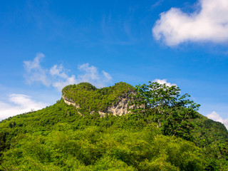 beautiful nature of mountain in the shape of heart with blue sky background. At Surat Thani,...