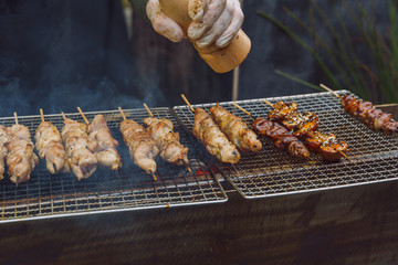 City Riga, Latvia. Street Restaurant food festival. Meat is grilled on the grill.