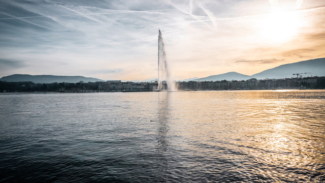 Panoramic view of Geneva lake with the famous Jet d'Eau or water jet and cityscape in Geneva Switzerland