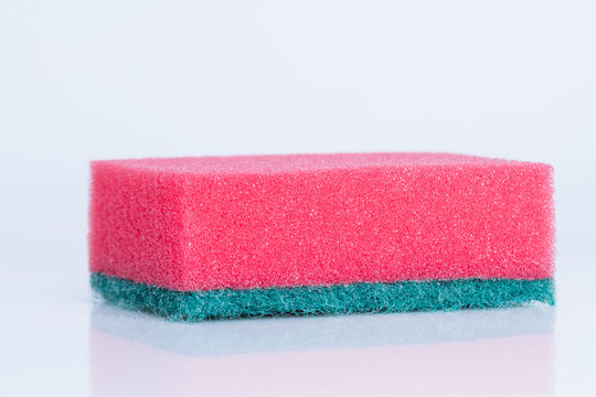 Red dish washing sponge - Powered by Adobe