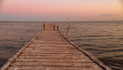 Fototapeta premium Wooden bridge to the sea..