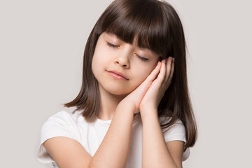 Fototapeta premium Calm 6 years old small adorable kid feeling sleepy